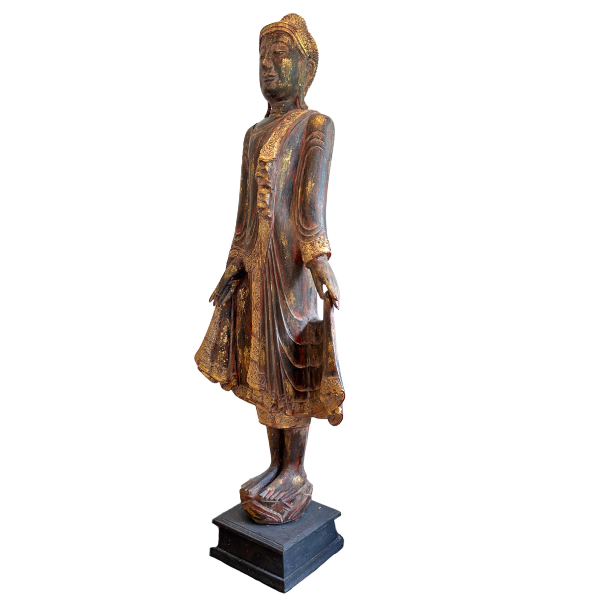 Full view of a monumental antique Burmese teak Buddha.