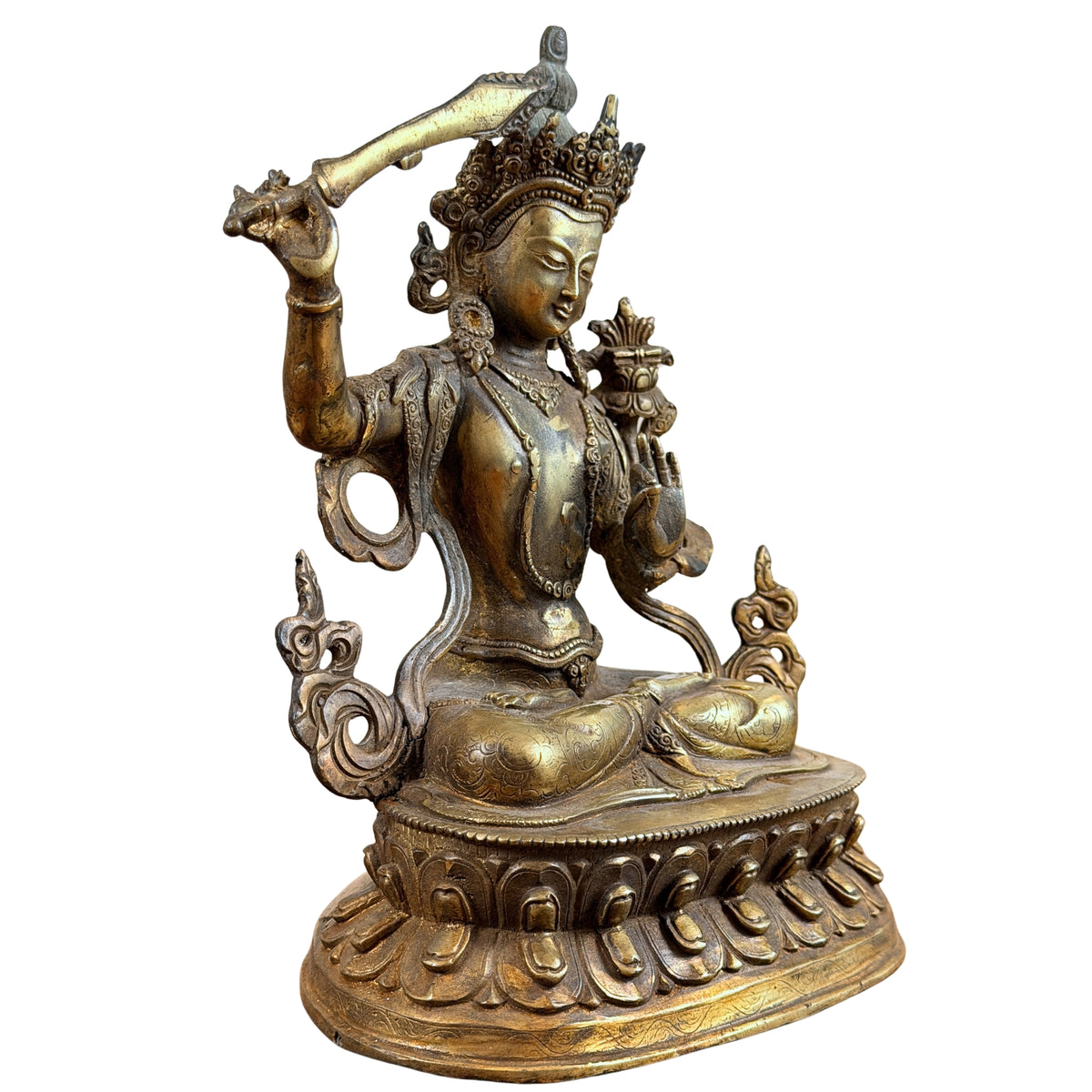 Manjushri schräg von vorne mit Schwert, Lotusbuch und reich verziertem Lotossockel