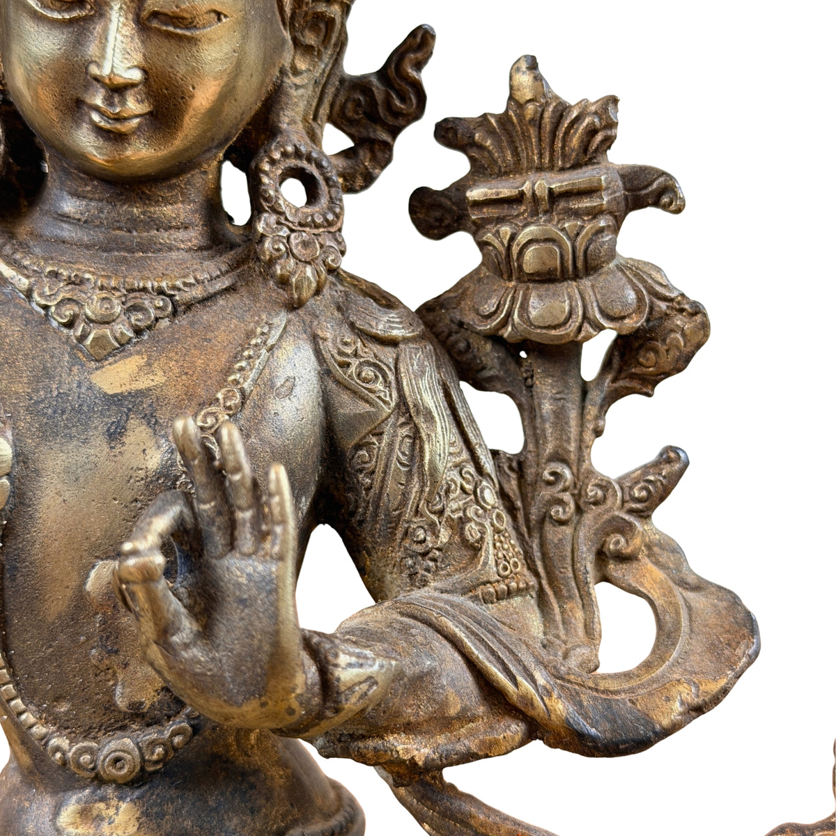 Manjushris Handgeste vor der Brust und das Buch auf dem Lotus neben der Schulter
