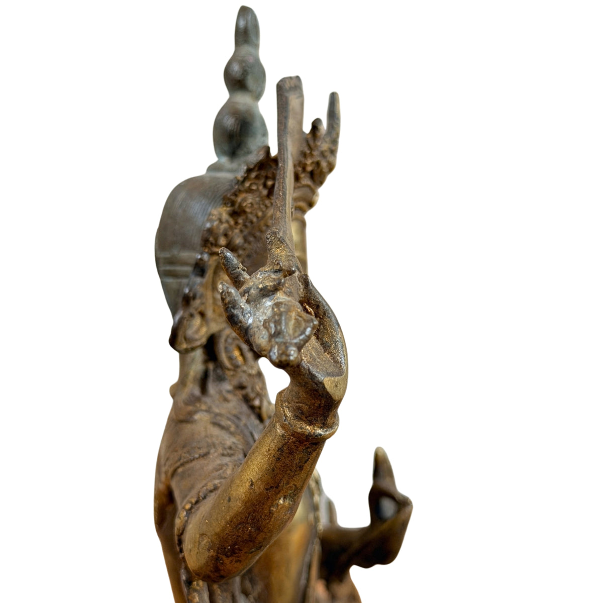Manjushri im Profil mit Krone, Ohrgehänge und erhobenem Arm