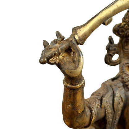 Manjushris rechte Hand am Griff des Weisheitsschwerts