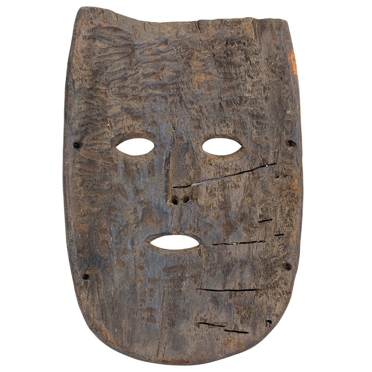Rückseite der nepalesischen Holzmaske mit alten Befestigungslöchern und Gebrauchsspuren