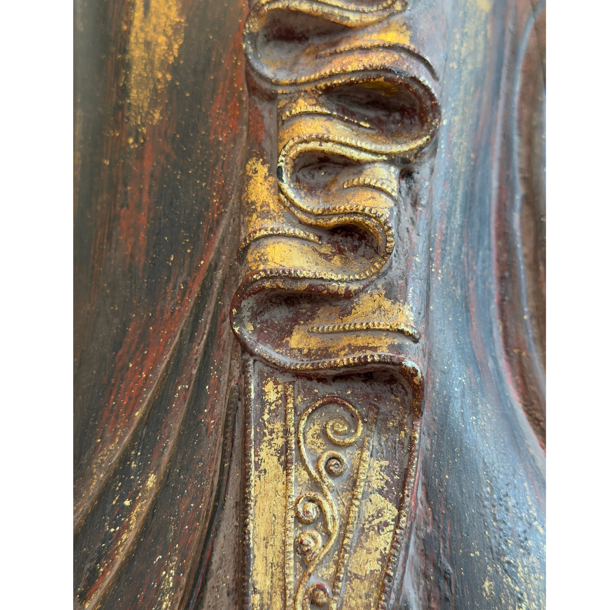 Original gilding on an antique Burmese Buddha
