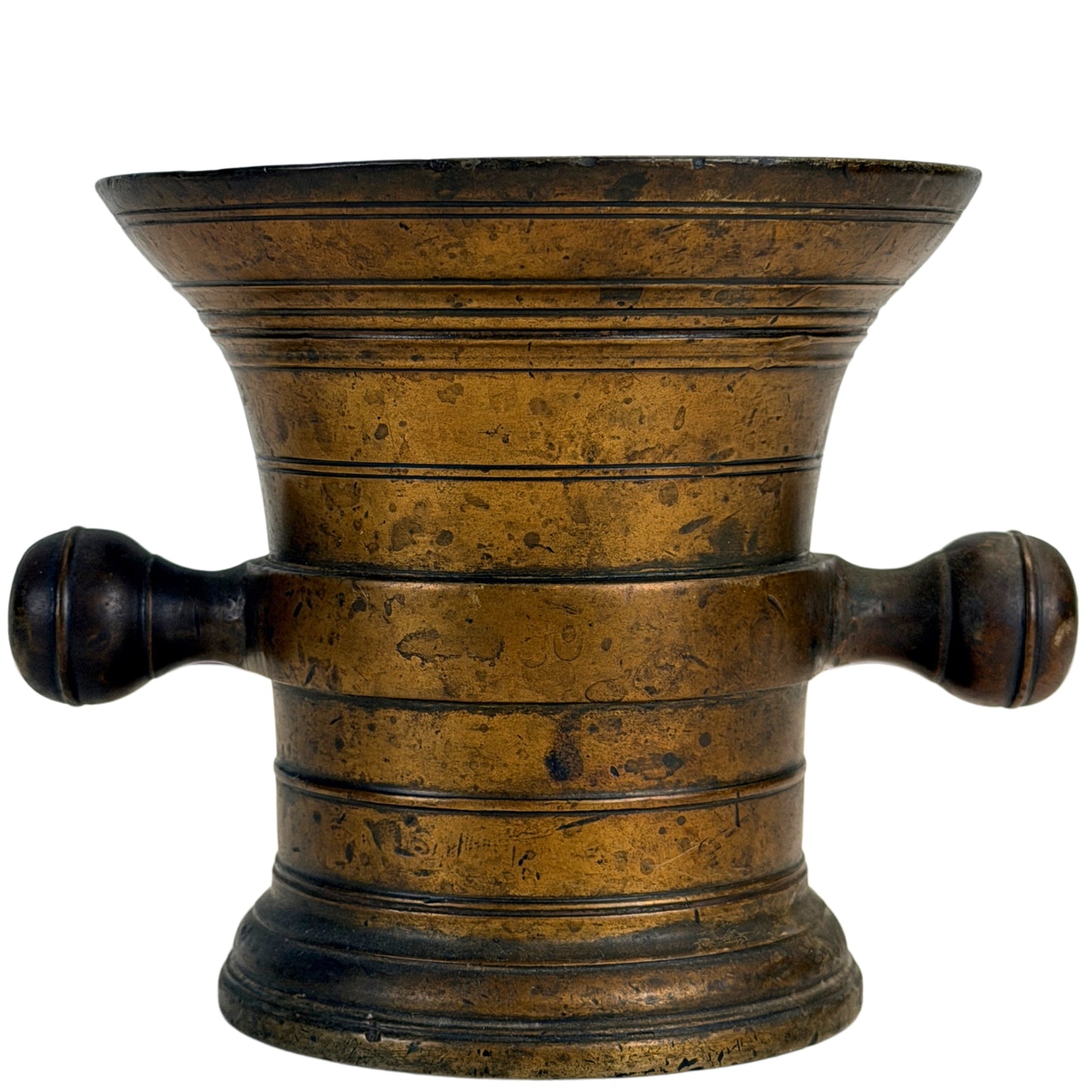 Detail van antieke bronzen vijzel met natuurlijke patina en gebruikssporen