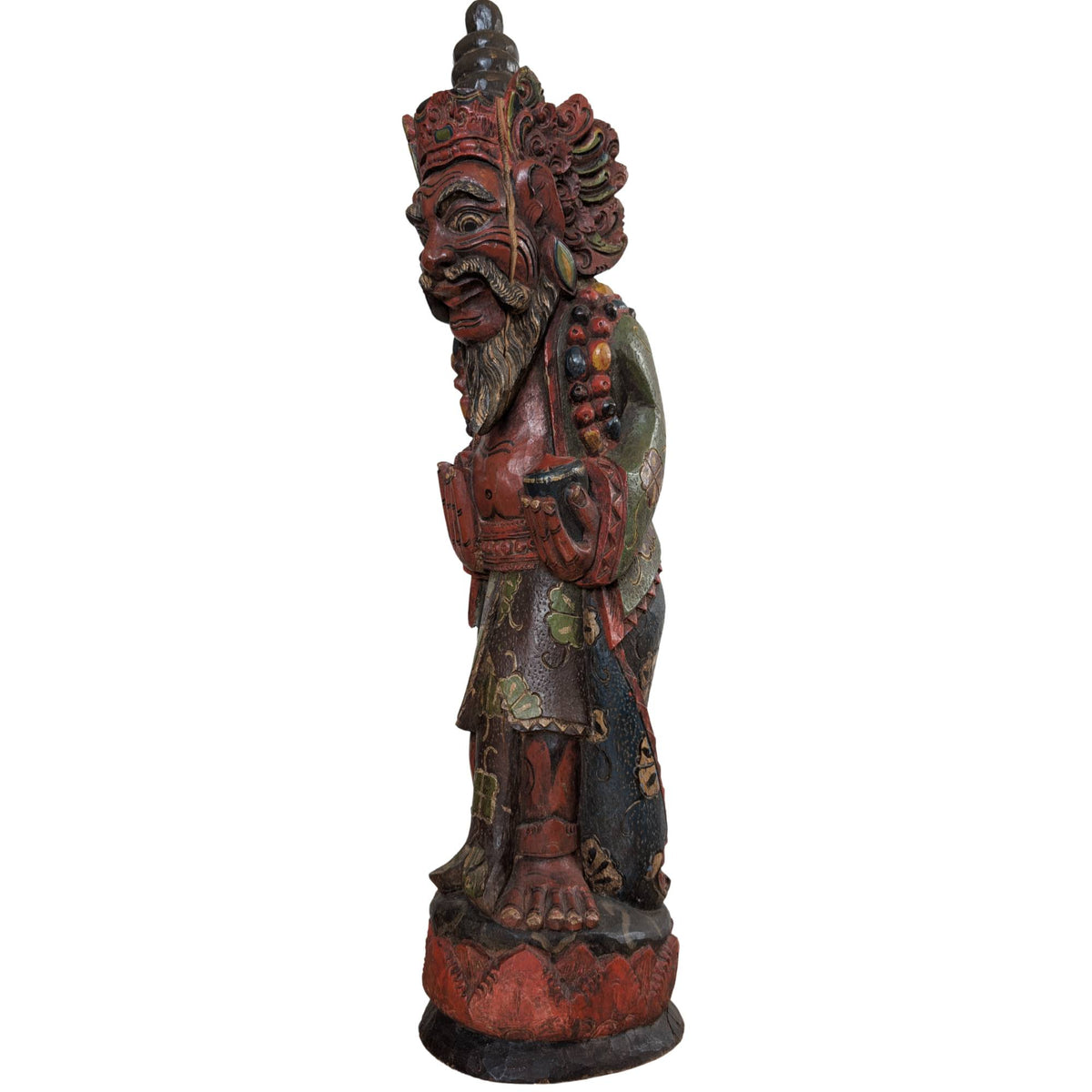 Close-up of the polychrome paint and the natural patina of the woodcarving.