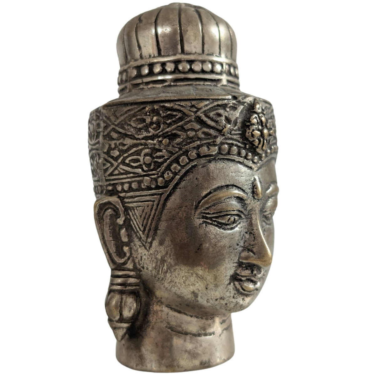 Three-quarter view of the Buddha head with focus on the serene facial features.