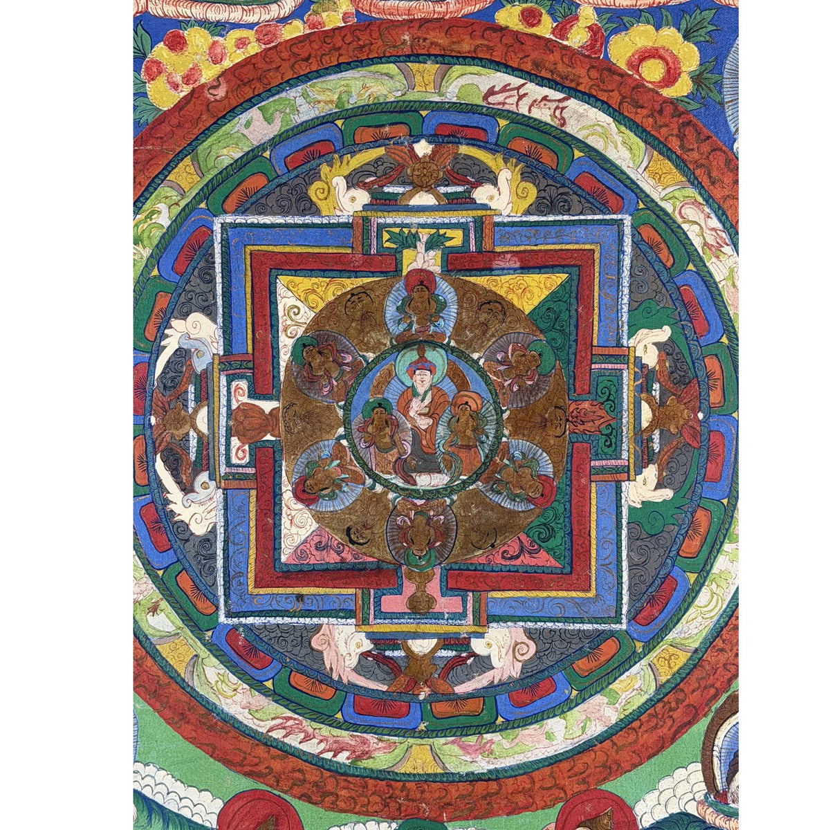 Tibetische Mandala‑Thangka mit feinen Goldakzenten und traditioneller Komposition