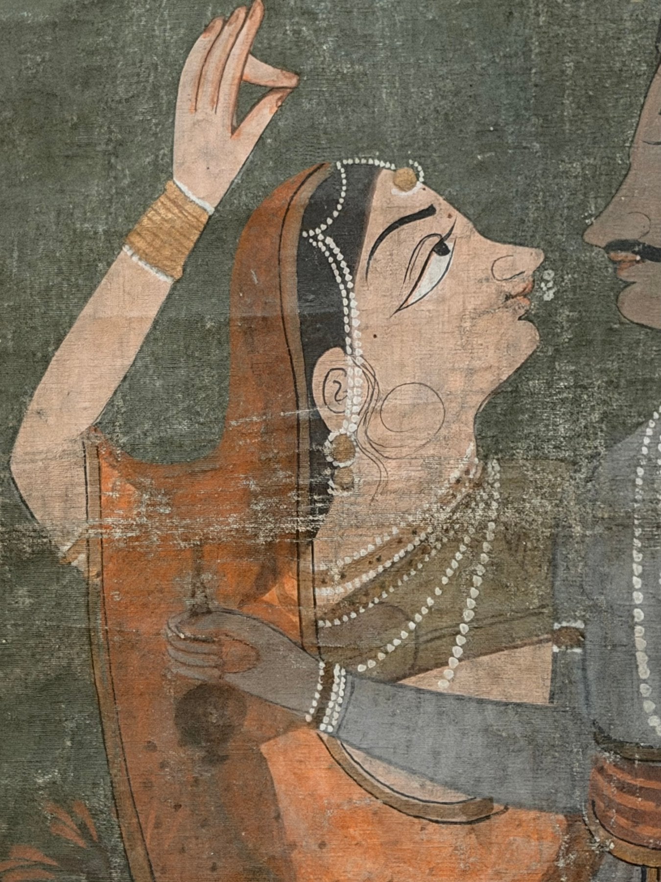 Traditionelle indische Malerei von Krishna mit weiblichen Figuren