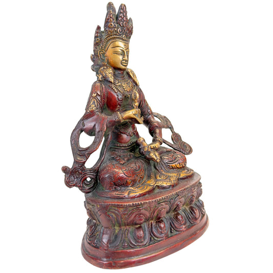 Detail des Gesichts von Vajrasattva mit vergoldeter Haut, hoher Krone und fein gearbeiteten, himalayischen Ornamenten