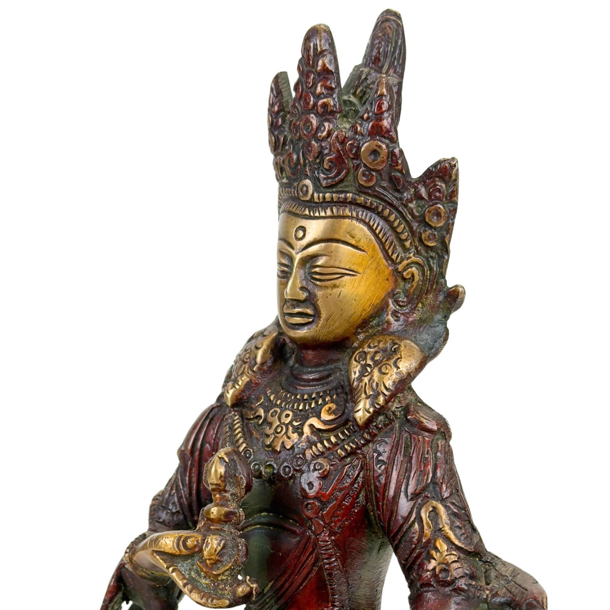 Detail einer Vajrasattva-Darstellung mit Vajra und Ghanta, Symbolen für Mitgefühl, Weisheit und spirituelle Reinigung.