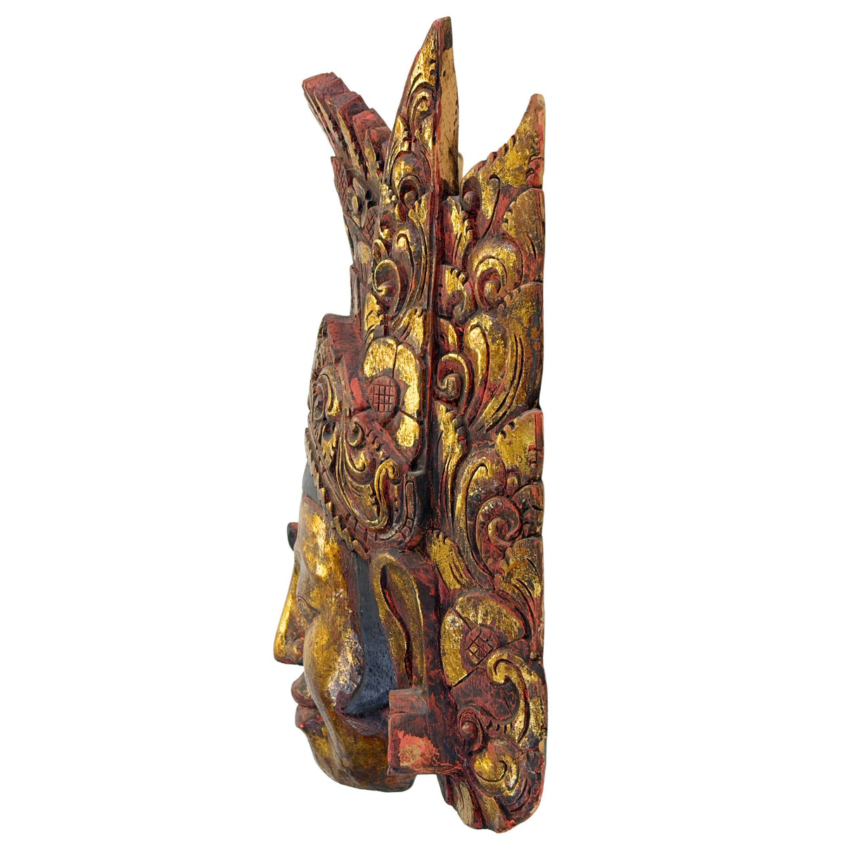 Linke Seitenansicht der vintage-indonesischen Tempelmaske aus Bali, mit klarer Darstellung der Dicke und der organischen Struktur des Pule‑Holzes.