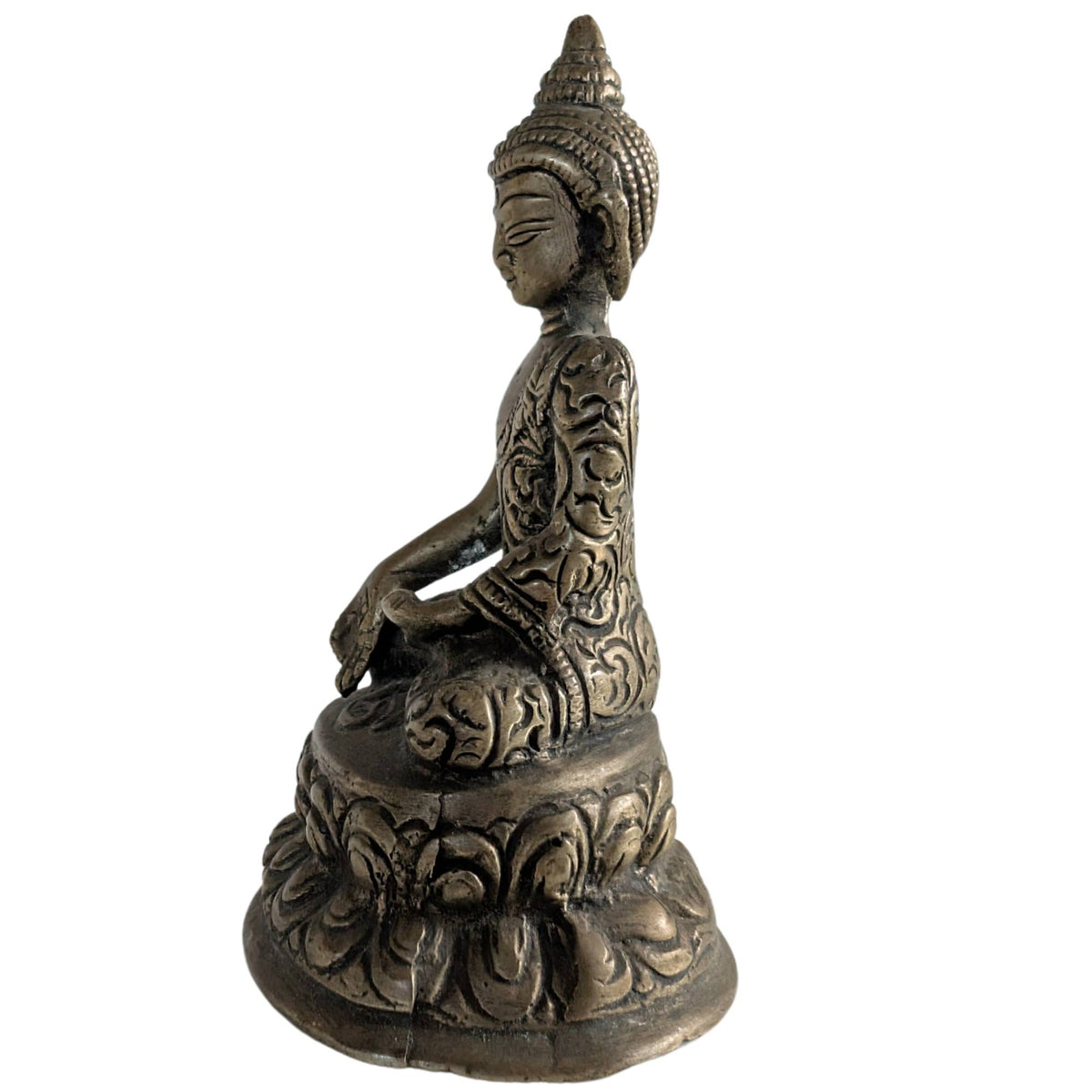Side view of the sitting Buddha figure in traditional Nepalese style.