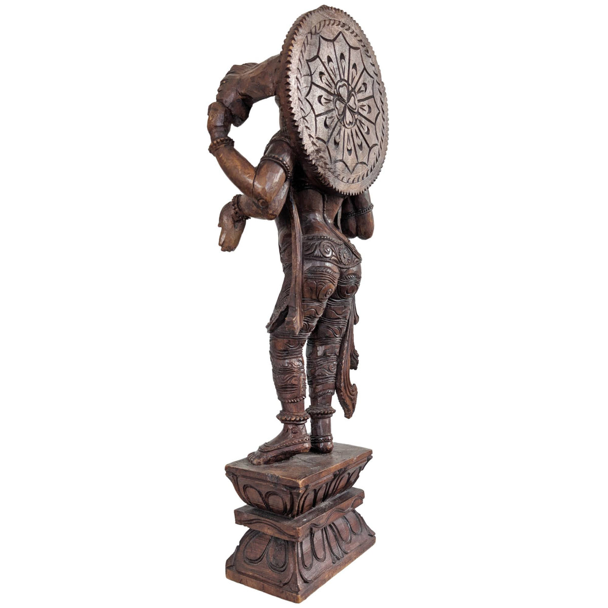 Profile of the hand-carved wooden Vishnu statue from India.