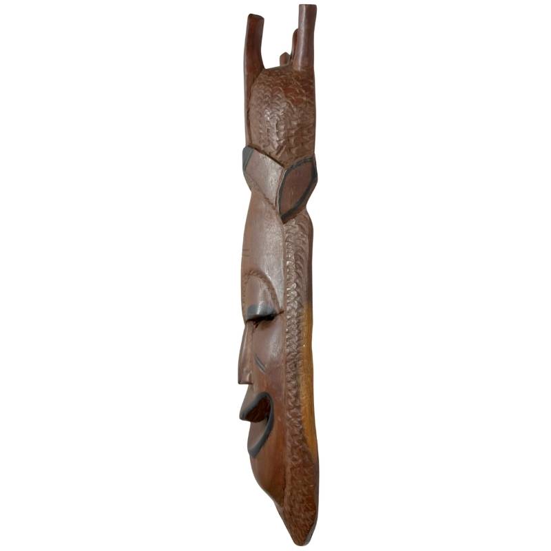 Seitenansicht der 2 kg schweren Maske aus massivem afrikanischem Hartholz, die sich perfekt als exklusive Wanddekoration eignet.