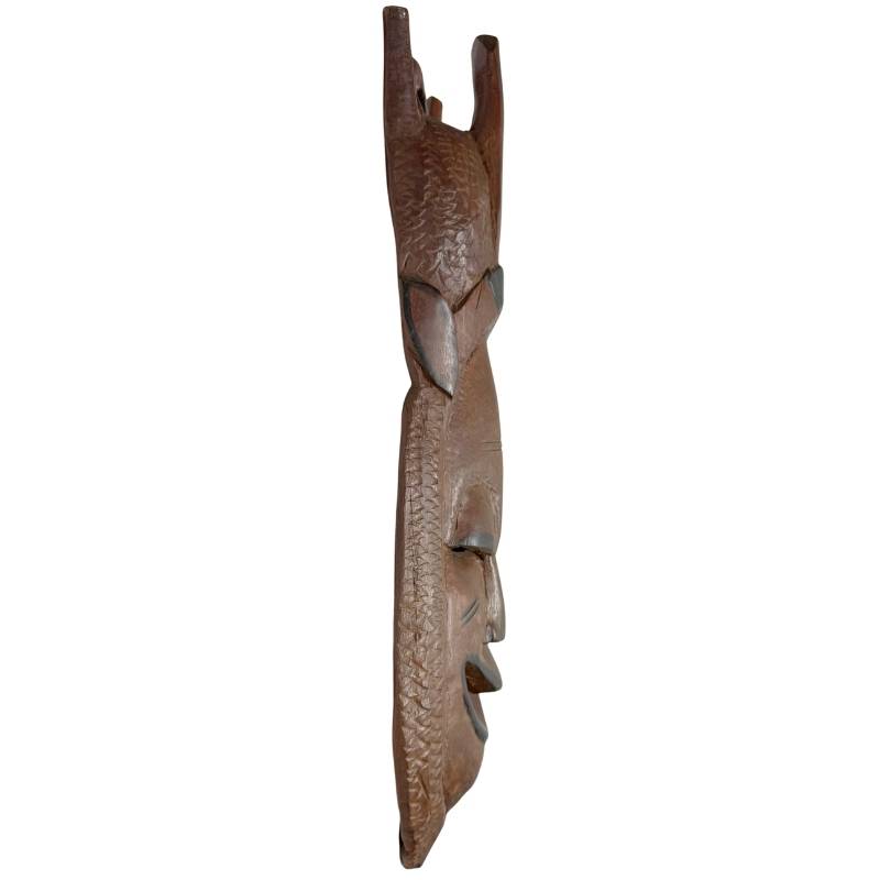 Seitenansicht der 2 kg schweren Maske aus massivem afrikanischem Hartholz, die sich perfekt als exklusive Wanddekoration eignet.